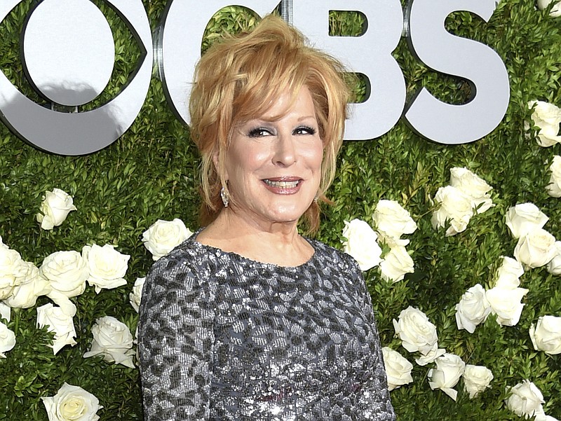 In this June 11, 2017 file photo, Bette Midler arrives at the Tony Awards in New York. Midler is apologizing for a tweet that caused a social media backlash when she compared the struggle of women with the history of racism. The singer and actress wrote that women "are the n-word of the world" and "They are the most disrespected creatures on earth." Midler was quoting the title of a 1972 song written by John Lennon and Yoko Ono. (Photo by Evan Agostini/Invision/AP, File)