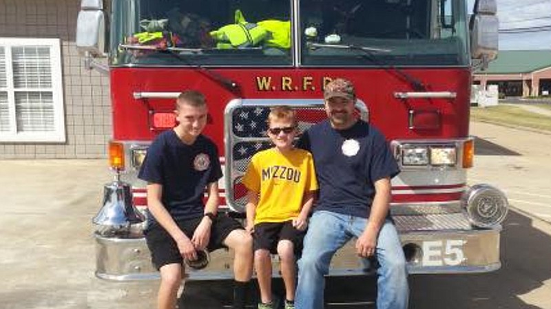 North Callaway Fire Protection District volunteer Tim Hays, right, is recovering after receiving a serious head injury while responding to a call Friday night, Oct. 5, 2018.