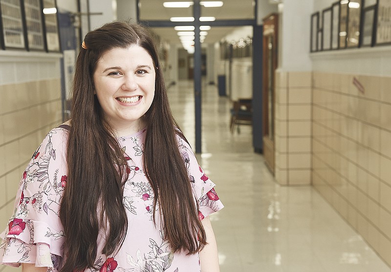 Amy Heflin, Russellville Middle and Elementary Schools' newest counselor, poses in the hallway at the elementary school Thursday.