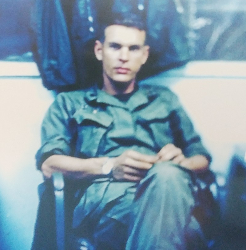 A 26-year-old Tom LeComte is pictured in 1968 while serving as a Huey pilot with the 189th Helicopter Assault Company in Vietnam.