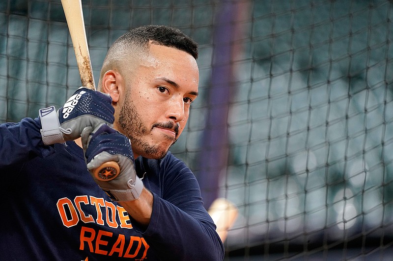 Houston Astros' Carlos Correa waits to bat during a baseball workout Thursday, Oct. 4, 2018, in Houston. The Astros play the Cleveland Indians in Game 1 of the American League Division Series Friday. (AP Photo/David J. Phillip)