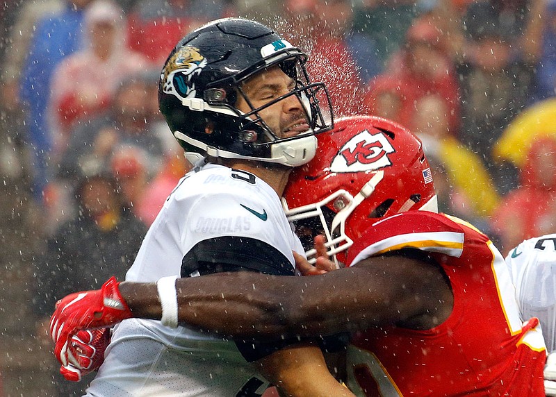 Jaguars quarterback Blake Bortles is hit by Chiefs linebacker Justin Houston after throwing a pass during the first half of last Sunday's game at Arrowhead Stadium in Kansas City.