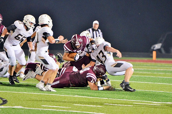 Mason Clarke of School of the Osage carries the ball during last Friday night's home game against Versailles.