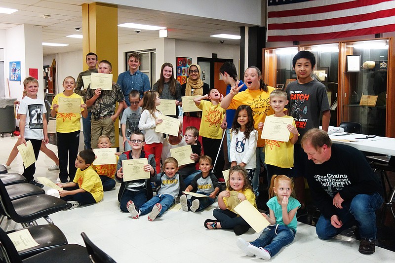 <p>Fulton Public Schools’ Board of Education recognized students for a variety of reasons recently. The majority pictured above participated in the Special Olympics on Oct. 5 at South Callaway High School, bringing home medals and memories.</p>