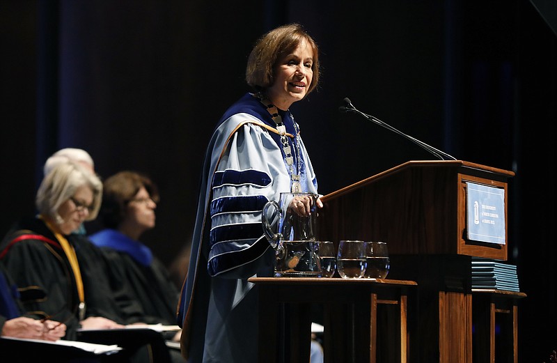 UNC Chapel Hill Chancellor Carol Folt speaks during University Day at Memorial Hall, Friday, Oct. 12, 2018 in Chapel Hill, N.C. Folt apologized Friday for the school's history of slavery, adding that words alone are not enough to atone for using enslaved people to build and maintain the campus. (Ethan Hyman/The News & Observer via AP)