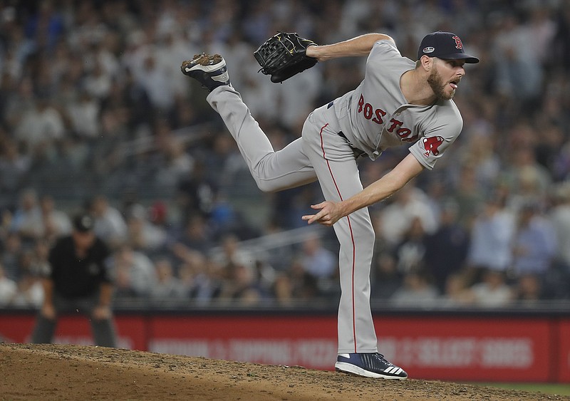 Boston Red Sox pitcher Chris Sale delivers against the New York Yankees during the eighth inning of Game 4 of baseball's American League Division Series, Tuesday, Oct. 9, 2018, in New York. (AP Photo/Julie Jacobson)