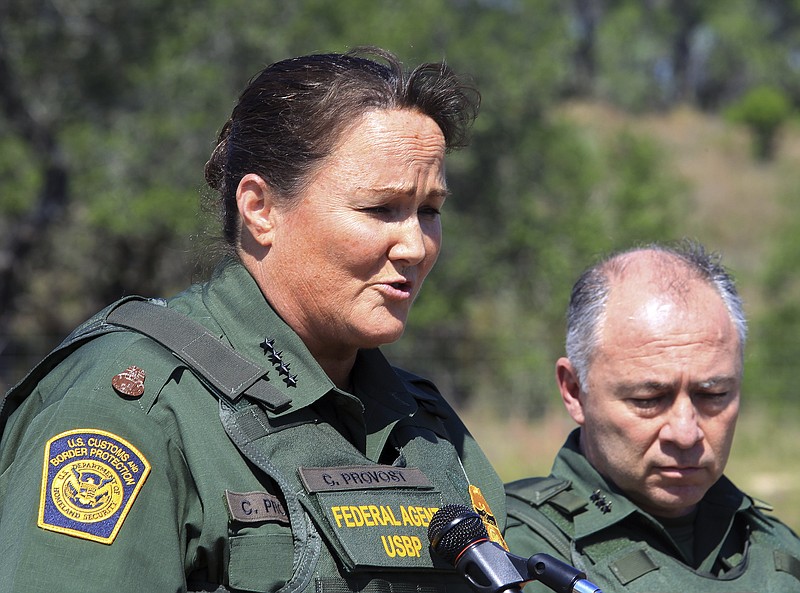 FILE - In this April 26, 2018, file photo, U.S. Border Patrol Acting Chief Carla L. Provost, left, meets with members of the media south of Falfurrias, Texas. Immigration authorities detain and process thousands of people every month who cross the U.S. border without permission. But when detained people try to make claims of misconduct, advocates say they run into a series of hurdles and issues that make their complaints difficult to substantiate. Border Patrol chief Provost said in a recent interview that her agency takes any allegations against any of its 19,000 agents "very, very seriously." (Joel Martinez/The Monitor via AP File)