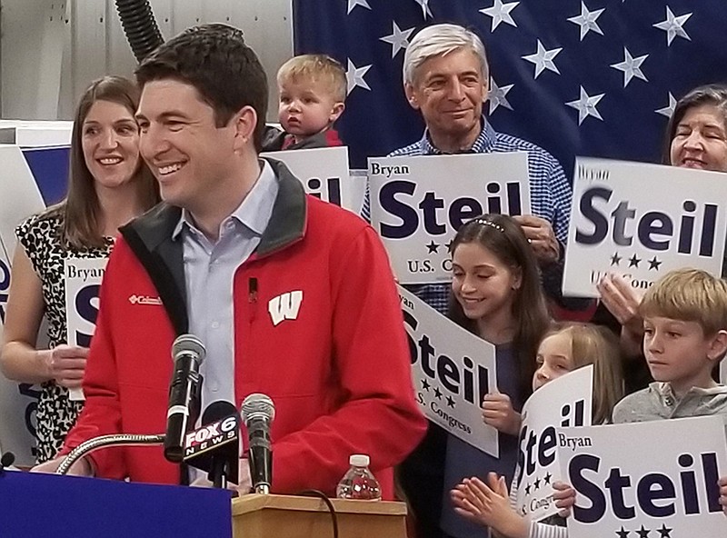 FILE - In this April 22, 2018, file photo, attorney Bryan Steil, a former driver for House Speaker Paul Ryan, announces he is running to succeed Ryan the U.S. House, in Janesville, Wis. Ryan's protege is looking to keep his mentor's Wisconsin district in Republican hands. Steil and Democrat Randy Bryce will square off Nov. 6, 2018, for the right to represent Wisconsin's 1st Congressional District. Ryan has held the seat for 20 years but announced in April that he would not seek re-election. (Jake Magee/The Janesville Gazette via AP, File)