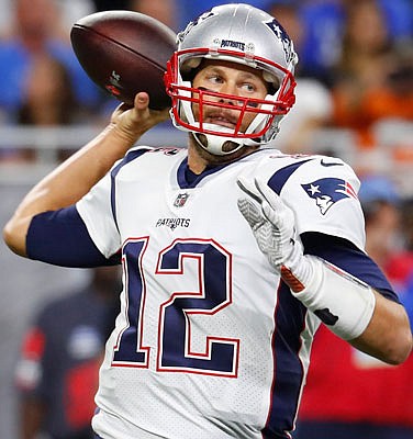 Patriots quarterback Tom Brady throws during a game against the Lions earlier this season in Detroit