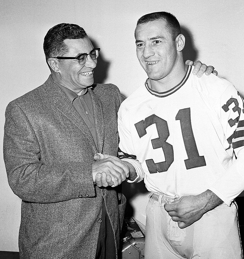 In this Dec. 13, 1962, file photo, Green Bay Packers coach Vince Lombardi, left, congratulates fullback Jim Taylor in Long Beach, Calif., after Taylor learned he had been named played of the Year in the National Football League by an Associated Press Committee. The Hall of Fame fullback died early Saturday, OC.t 13, 2018, the Packers announced. He was 83.
(AP Photo/DFS, File)