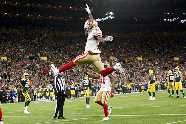 49ers wide receiver Marquise Goodwin celebrates after a touchdown during Monday night's game against the Packers in Green Bay, Wis.