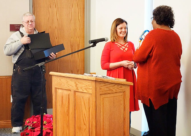 Nancy Hanson, center, was the recipient of the 2017 Jane Bierdeman-Fike Award, awarded annually by the City of Fulton Human Rights Commission and Callaway County. Ten nominees were introduced at the luncheon at Fulton City Hall, and the award was presented by Carmen Brandt and Tom Clapp, both members of the commission.