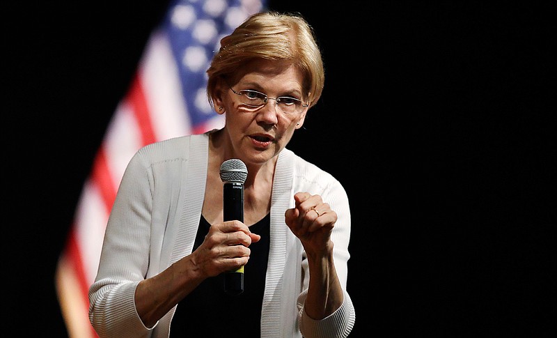 In this Aug. 8, 2018, file photo, U.S. Sen. Elizabeth Warren, D-Mass., speaks during a town hall style gathering in Woburn. Warren is striking back at President Donald Trump over his constant ridicule of her claim of Native American ancestry, saying comments Trump has made are "creepy." (AP Photo/Charles Krupa, File)