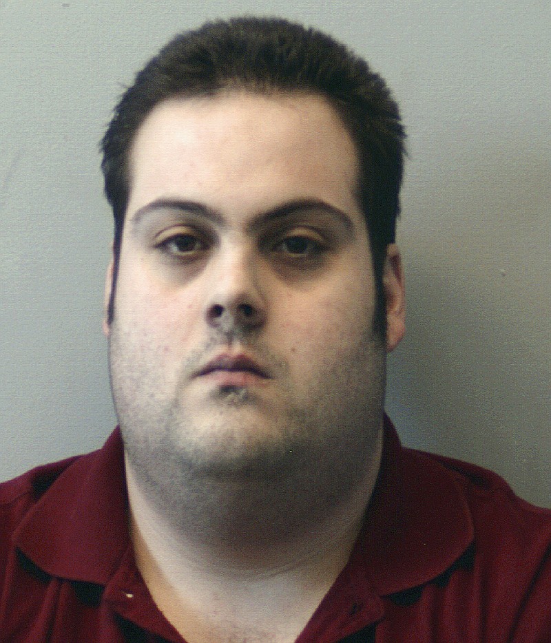 FILE - This file booking photo released March 1, 2018, by the Beverly Police Department shows Daniel Frisiello, of Beverly, Mass., accused of mailing five envelopes in February with threatening messages and a white substance, including one to Donald Trump Jr., that landed his wife, Vanessa, in the hospital. Frisiello is expected to plead guilty Wednesday, Oct. 17, 2018, in federal court in Boston. (Beverly Police Department via AP, File)