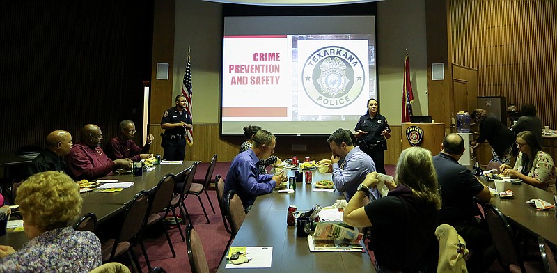 Kristi Bennett of the Texarkana, Ark., Police Department speaks to the public about crime prevention and safety at the Luncheon with the Law event Tuesday at the Bi-State Justice Center in Texarkana. Bennett spoke of how to avoid situations that could possibly be an invitation for crime to occur, security tips for home and what to do if one is a victim of a crime.
