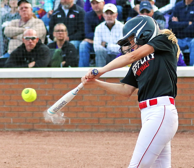 Olivia Wallace of the Lady Jays smacks a single to center field during the second inning of Wednesday's Class 4 sectional game against Troy-Buchanan at Vogel Field.