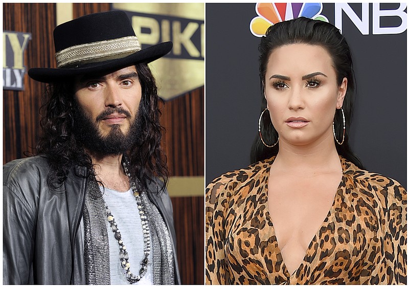 This combination photo shows Russell Brand at "Eddie Murphy: One Night Only," a celebration of Murphy's career in Beverly Hills, Calif., on Nov. 3, 2012, left, and singer Demi Lovato at the Billboard Music Awards in Las Vegas on May 20, 2018.  Celebrities are now owning the struggle and their roads to recovery. Brand wrote a book about addiction, "Recovery: Freedom from Our Addictions," calling this the age of addiction an epidemic. Lovato took to Instagram with a health update not long after her recent overdose: "I have always been transparent about my journey with addiction. What I've learned is that this illness is not something that disappears or fades with time. It is something I must continue to overcome and have not done yet." (AP Photo)