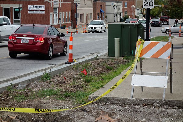 Sidewalks and street corners are torn up in downtown Fulton, part of the project on U.S. 54.