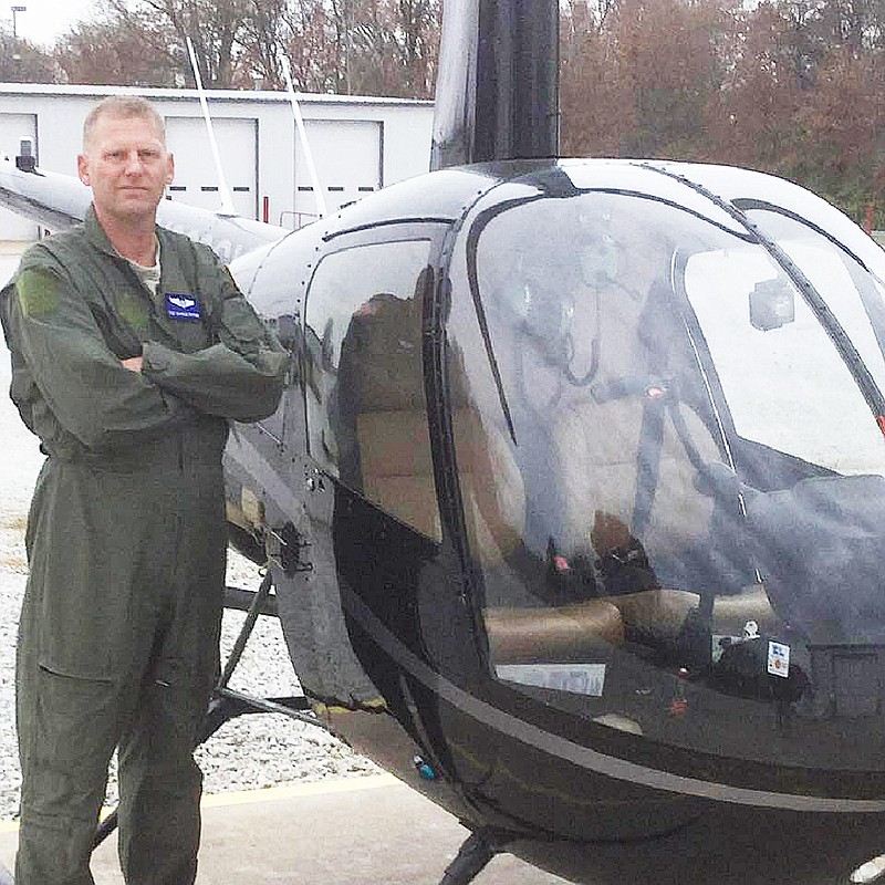<p>Submitted</p><p>Charles Prather stands near a helicopter. The St. Louis-area man and former soldier died last week while flying near Fulton, leaving behind his parents. He will be buried Thursday in Jefferson Barracks National Cemetery.</p>