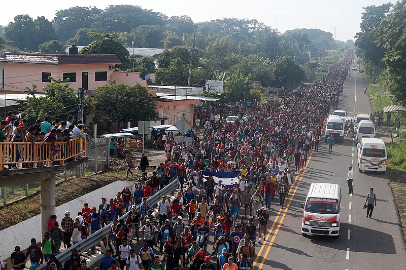 Central American migrants walking to the U.S. start their day Sunday departing Ciudad Hidalgo, Mexico. Despite Mexican efforts to stop them at the border, about 5,000 Central American migrants resumed their advance toward the U.S. border early Sunday in southern Mexico.