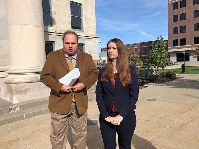 Attorney Stephen Wyse and Missouri House District 50 candidate Michela Skelton, a Democrat, begin a news conference at the Boone County Courthouse in Columbia on Wednesday, Oct. 24, 2018.