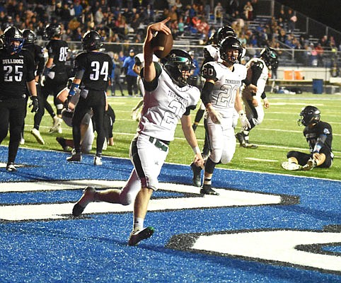 North Callaway quarterback Jadon Henry celebrates after scoring the 2-point conversion to tie the game at 26 in last week's Callaway Cup rivalry game against South Callaway in Mokane. The Thunderbirds lost to the Bulldogs 33-32 in overtime.