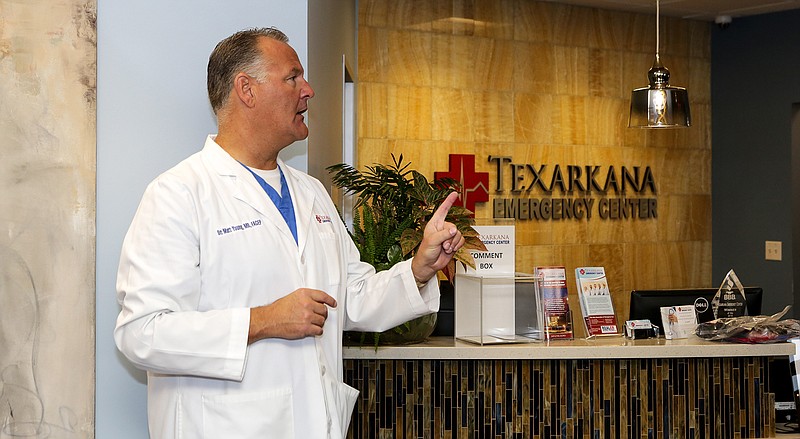Dr. Matt Young, emergency physician and owner of Texarkana Emergency Center, speaks to the audience about Stop the Bleed kits that were donated to area state police on Wednesday in Texarkana, Texas. The center donated 60 kits to Arkansas state troopers and Texas Department of Public Safety. Texarkana Emergency Center has donated more than 650 Stop the Bleed kits to schools, law enforcement, fire departments and first responders.