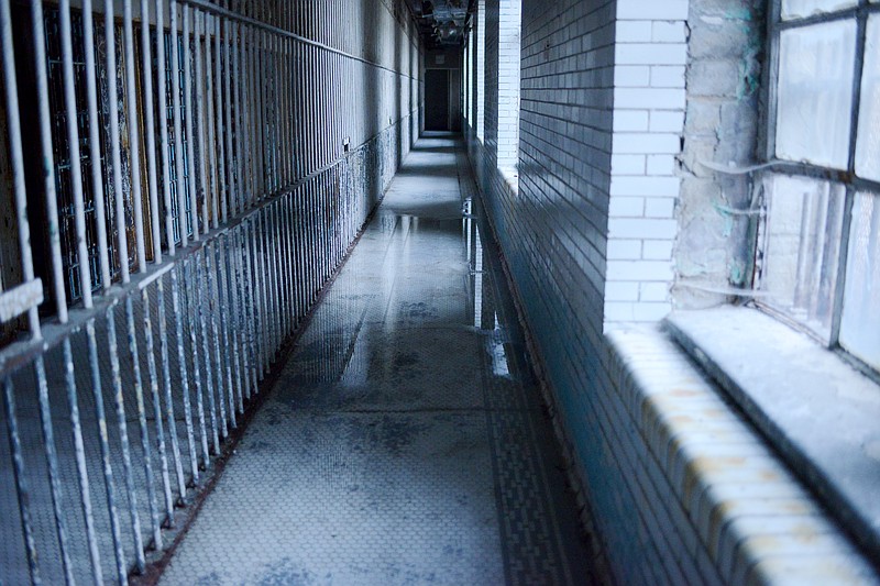 Sally Ince/ News TribuneCaged cells line a hallway of Housing Unit-3 Wednesday October 10, 2018 at Missouri State Penitentiary. Visitors can register for a variety of tours, including ghosts tours, offered at the the prison. Guests can also opt to bring their own paranormal finding equipment or check out equipment offered by the prison during their tour. 