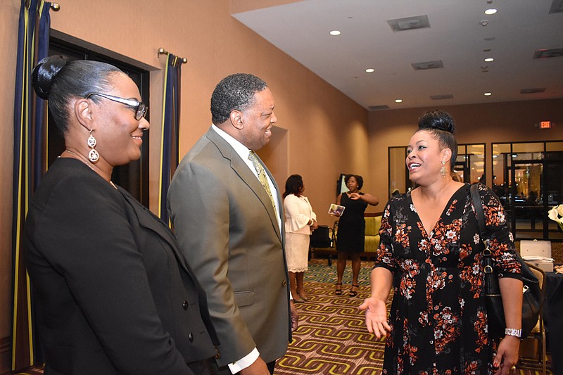 Former Arkansas Sen. Tracy Steele, center, visits with guests Saturday prior to the 2018 Freedom Fund Awards Banquet at the Texarkana, Texas, Convention Center. The event was sponsored by the Greater Texarkana Branch of the NAACP. Steele serves on the North Little Rock School Board.