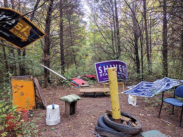 A half-dozen stolen political signs were recovered Thursday morning in the woods near Fulton High School. Police also found a sign swiped from William Woods University and a barrier pole taken from a Fulton walking trail.
