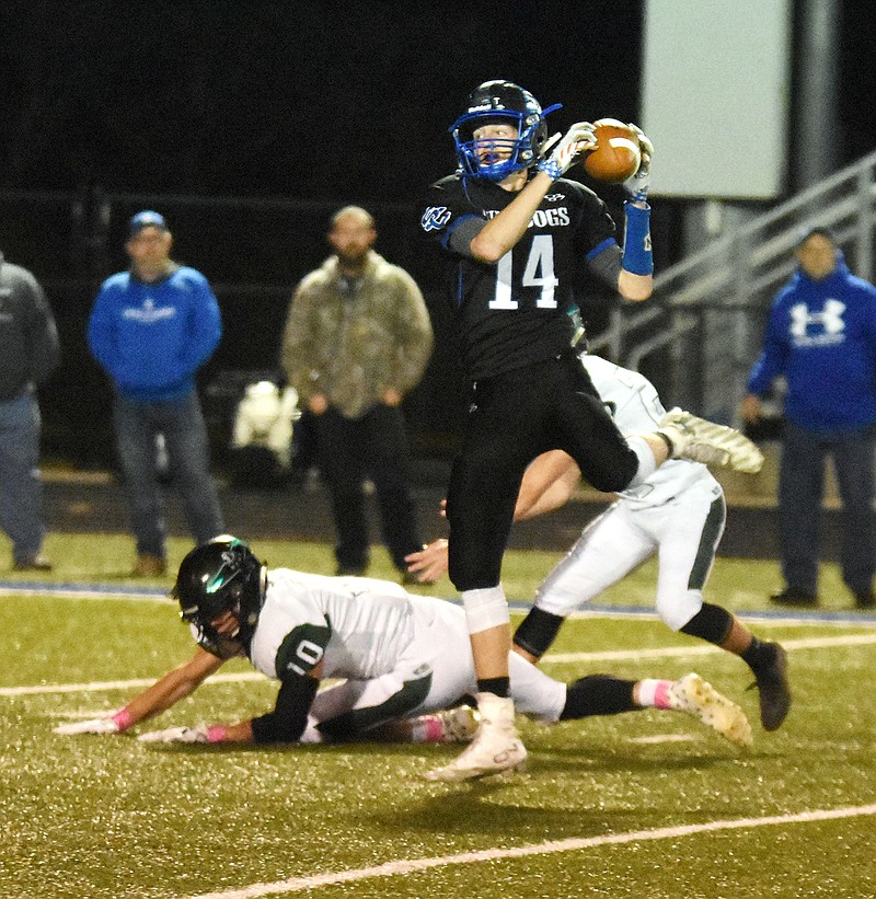 South Callaway senior wide receiver Dylan Paschang leaps to pull in a pass from senior quarterback Peyton Leeper on a 47-yard catch-and-run for a touchdown in the first quarter of the Bulldogs' 33-32 overtime win over the North Callaway Thunderbirds in the annual Callaway Cup rivalry game Oct. 19 in Mokane. North Callaway and South Callaway meet again tonight in Mokane in a showdown in the Class 2, District 5 semifinals.