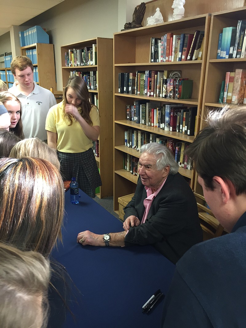 <p>The late Holocaust survivor Ben Fainer shows his numbered concentration camp identification tattoo to Helias Catholic High School students several years ago. Submitted by Sarah Kempker.</p>