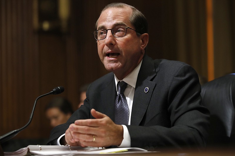 FILE - In this June 26, 2018 file photo, Health and Human Services Secretary Alex Azar speaks on Capitol Hill in Washington.  A DEA report obtained by The Associated Press shows heroin, fentanyl and other opioids continue to be the highest drug threat in the nation. The National Drug Threat Assessment will be released publicly later Friday.  Azar said earlier this month that overdose deaths have now begun to level off. But he cautioned it is too soon to declare victory.   (AP Photo/Jacquelyn Martin)