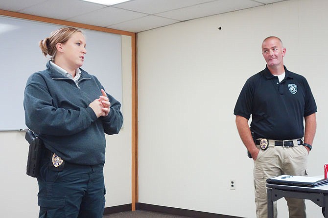 Detective Crystal Kent, left, and and Lt. Jason Barnes of the Fulton Police Department gave local business owners tips about preventing burglaries. Step one: Lock up.