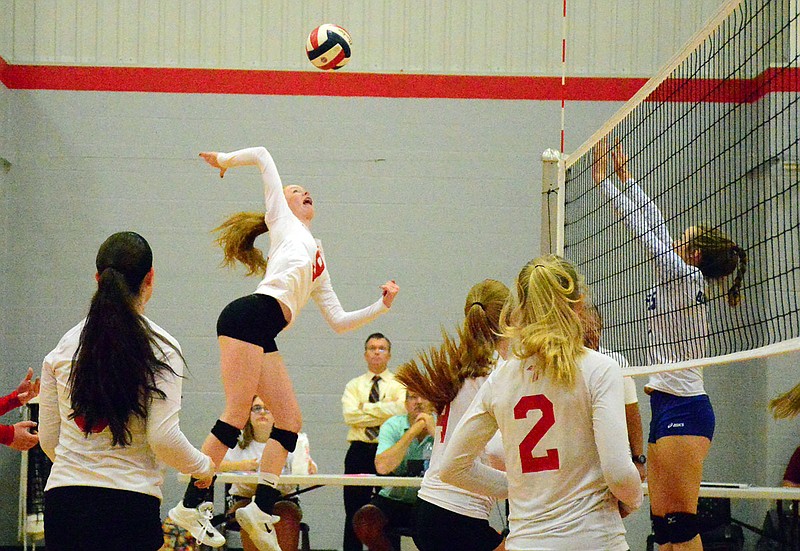 Olivia Bexten of Calvary Lutheran leaps up for a spike during a game this season against Boonville at Calvary.