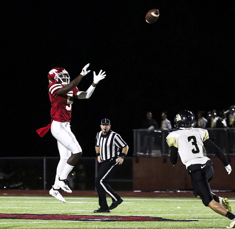 Razorbacks defensive back Dejordan Mask intercepts a pass from the De Queen Leopards' quarterback on Friday, November 2, 2018, at Razorback Stadium in Texarkana, Ark. 