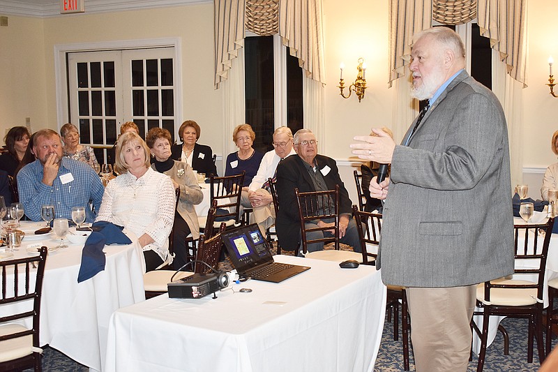 Alex Baker speaks Sunday to Cole County Historical Society and Museum annual dinner attendees. The evening's topic was a discussion on the research done on tzi, a mummified frozen iceman who lived approximately 5,300 years ago.