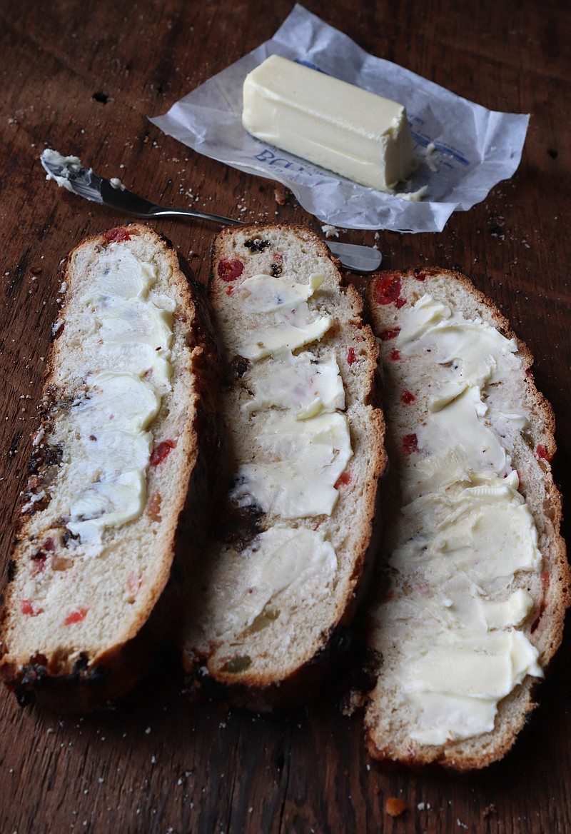 Barmbrack, here with butter, is a traditional bread that is slightly sweet, with raisins and bits of candied fruit in it. (Hillary Levin/St. Louis Post-Dispatch/TNS)