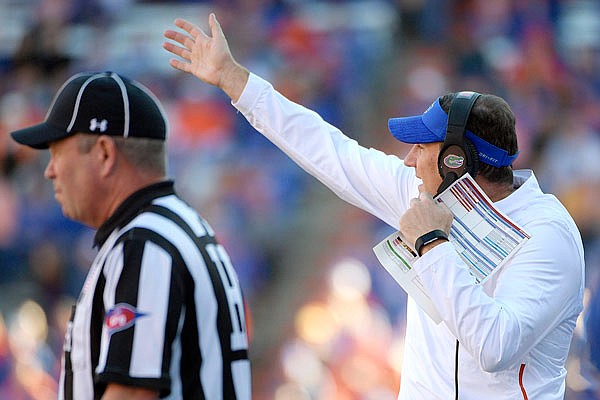 Florida coach Dan Mullen reacts on the sideline during the first half of Saturday's game against Missouri in Gainesville, Fla.