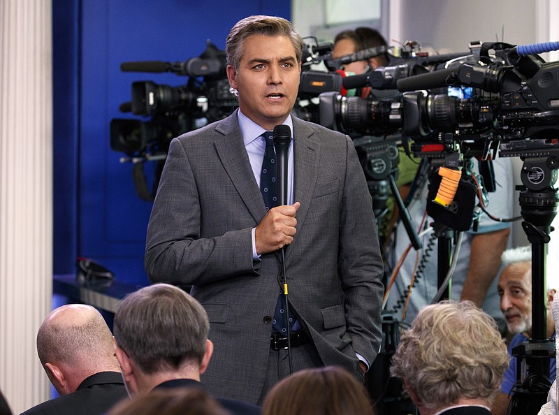 FILE - In this Aug. 2, 2018 file photo, CNN correspondent Jim Acosta does a stand up before the daily press briefing at the White House in Washington. The White House on Wednesday suspended the press pass of CNN correspondent Jim Acosta after he and President Donald Trump had a heated confrontation during a news conference. (AP Photo/Evan Vucci, File)