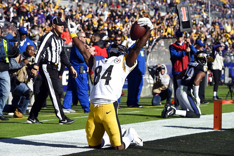 Pittsburgh Steelers wide receiver Antonio Brown celebrates after scoring a touchdown in the first half against the Baltimore Ravens on Sunday, Nov. 4, 2018, in Baltimore.
