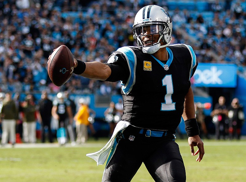 In this Sunday, Nov. 4, 2018, file photo, Carolina Panthers quarterback Cam Newton runs with the football against the Tampa Bay Buccaneers in the second half of an NFL football game in Charlotte, N.C. The Panthers face the Steelers on Thursday in Pittsburgh. (AP Photo/Nell Redmond, File)