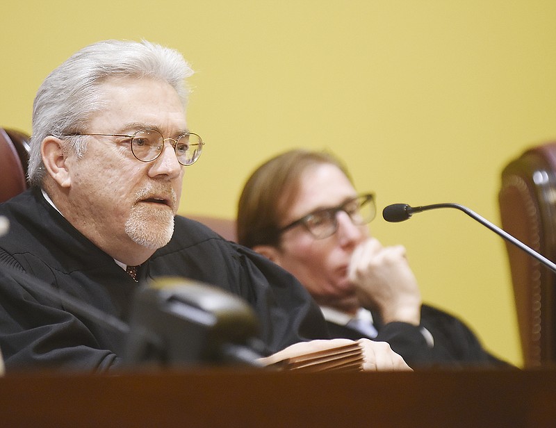 Judge Paul Wilson asks questions Wednesday during oral arguments in the Darrell Cope, et al. v. Michael L. Parson, et al. case heard by the Missouri Supreme Court en banc. Attorney Matthew Vianello argued Gov. Mike Parson did not have the constitutional authority to name a lieutenant governor after he became governor.