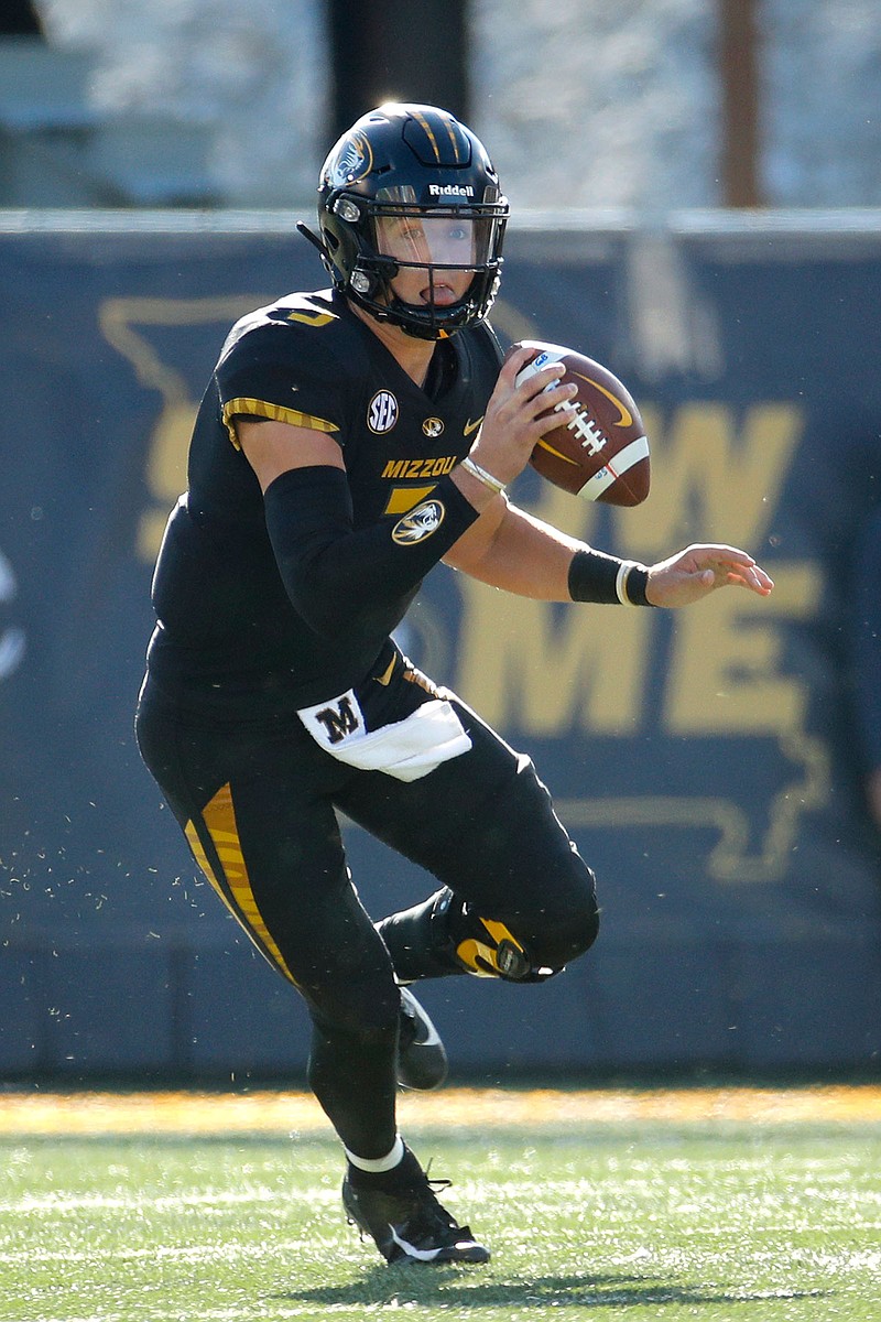 Missouri quarterback Drew Lock looks for a receiver during a game last month against Kentucky at Faurot Field in Columbia.