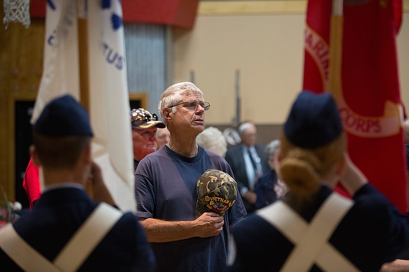 Veteran Larry David covers his heart during the national anthem at the annual Veterans Day ceremony on Nov. 10, 2017, sponsored by the Texarkana Gazette at Williams Memorial United Methodist Church.