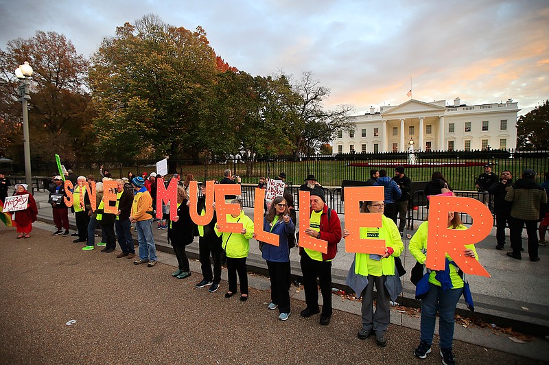 Protestors gather in front of the White House in Washington, Thursday, Nov. 8, 2018, as part of a nationwide "Protect Mueller" campaign demanding that acting U.S. Attorney General Matthew Whitaker recuse himself from overseeing the ongoing special counsel investigation. (AP Photo/Manuel Balce Ceneta)