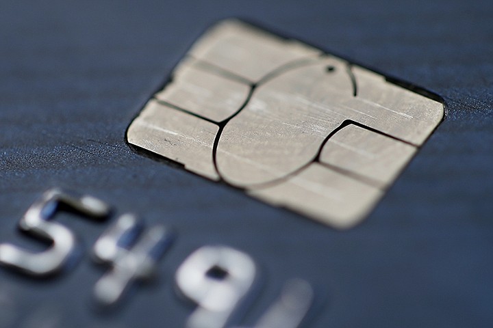 FILE- This June 10, 2015, file photo shows a chip credit card in Philadelphia. On Wednesday, Nov. 7, 2018, the Federal Reserve releases its September report on consumer borrowing. (AP Photo/Matt Rourke, File)