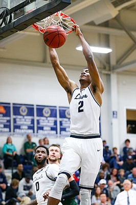 Terrance Smith of the Lincoln Blue Tigers dunks during a game last season against Missouri S&T at Jason Gym.