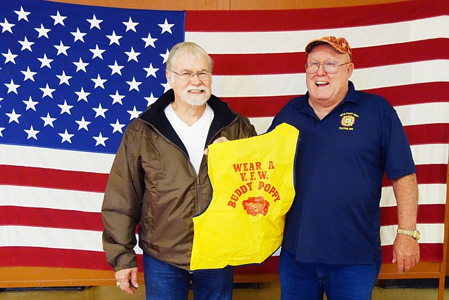 Dennis Byler, left, and Larry Underwood are Fulton VFW members and avid participants in the Buddy Poppy program. Byler earned three Purple Hearts during his time in Vietnam.
