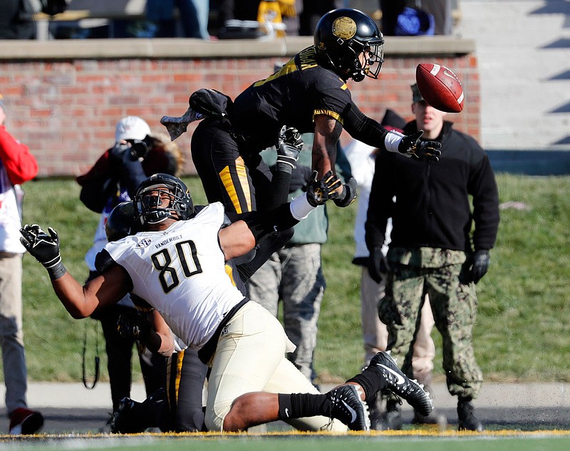 Missouri safety Cam Hilton breaks up a pass intended for Vanderbilt tight end Jared Pinkney in the end zone on the final play of Saturday's game at Faurot Field in Columbia.